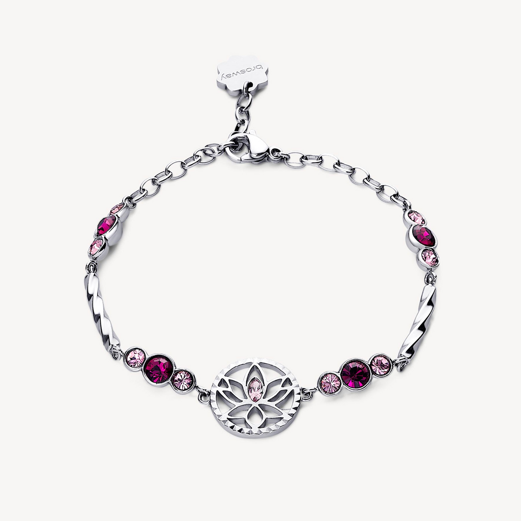 Stainless steel bracelet with pink gemstones.