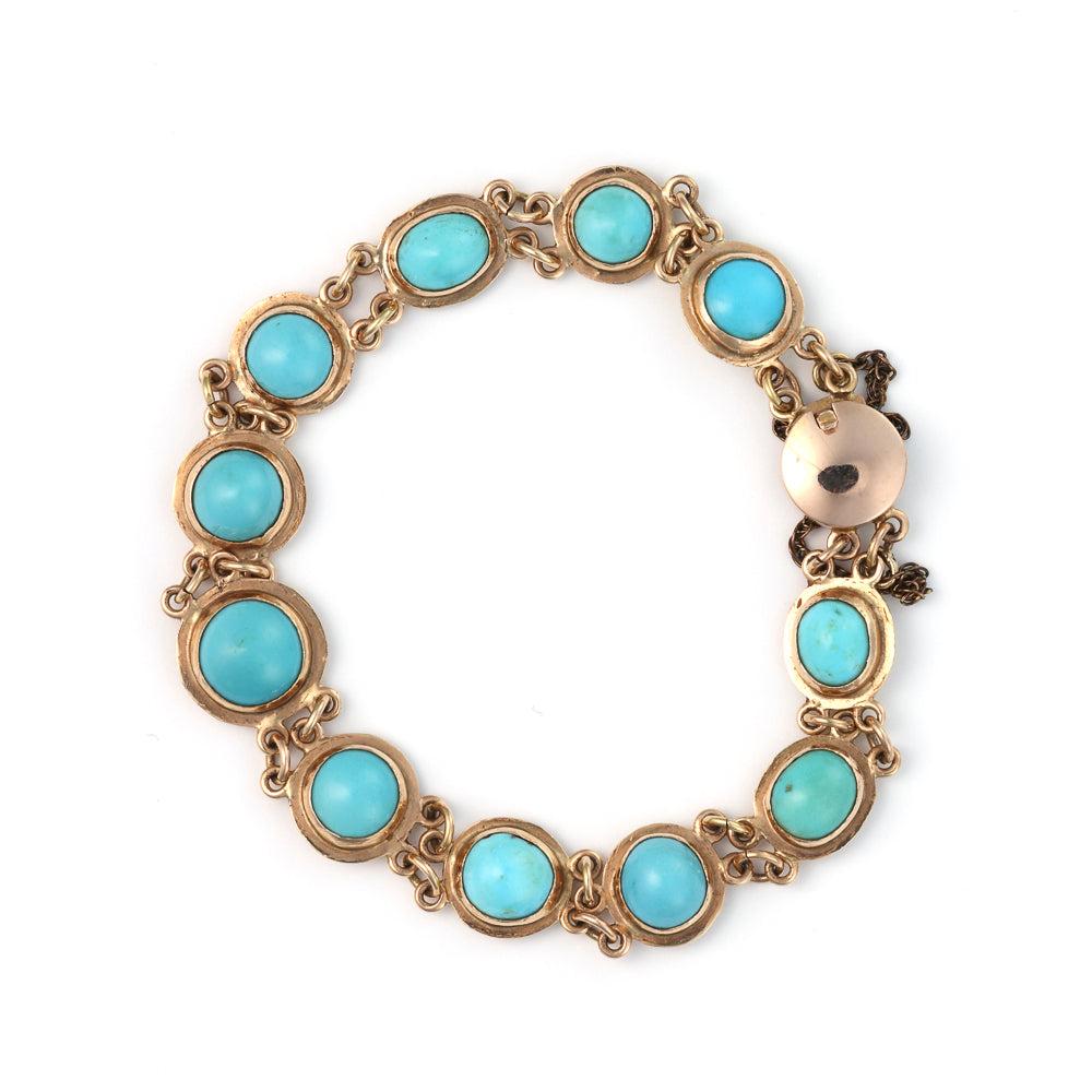 14K yellow gold bracelet with turquoise cabochons.