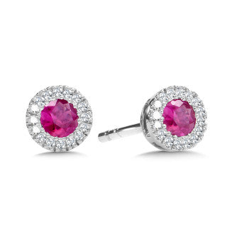 Ruby and diamond halo earrings in white gold.