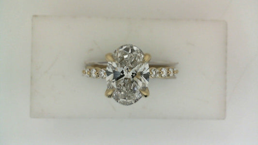 ReMARKable Designs Side Stone Lab-Grown Diamond Complete Engagement Ring in 14 Karat Yellow Gold with 2.09ct Oval Center Lab-Grown Diamond, Color: F, Clarity: VS2
