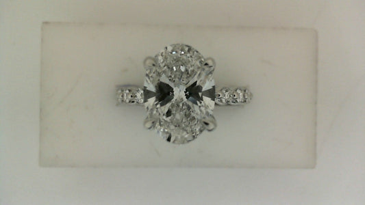 Side Stone Lab-Grown Diamond Complete Engagement Ring in 14 Karat White with 1 Oval Lab Grown Diamond, Color: E, Clarity: VS2, totaling 3.01ctw