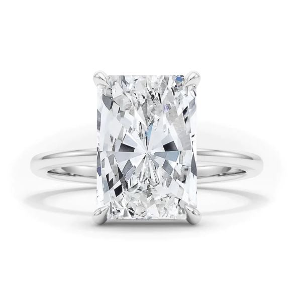 Solitaire engagement ring with radiant diamond.