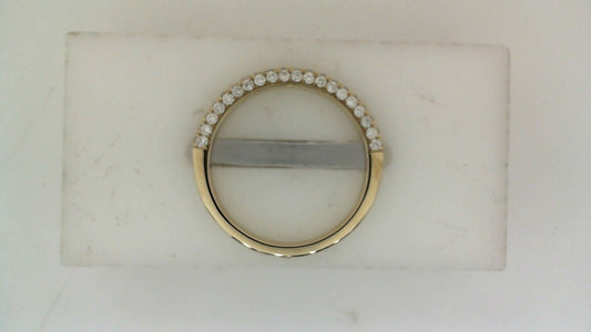 Yellow gold band with round diamonds.