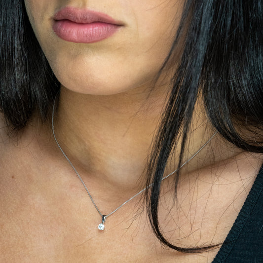 Diamond pendant on white gold chain.