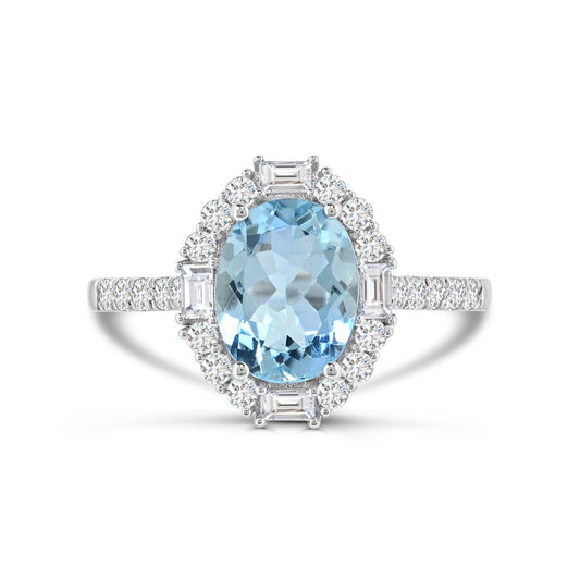 Oval aquamarine ring with diamond accents.
