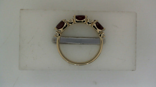ReMARKable Designs Oval Ruby Color Gemstone Ring in 14 Karat Yellow Gold with 3 Rubies 1.92ctw