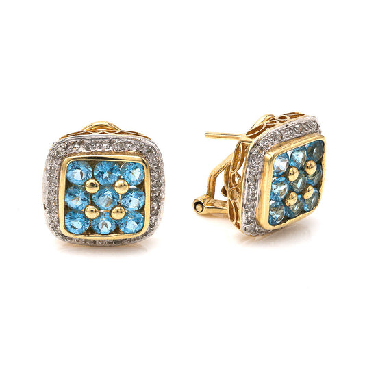 Yellow gold earrings with blue topazes and diamonds.
