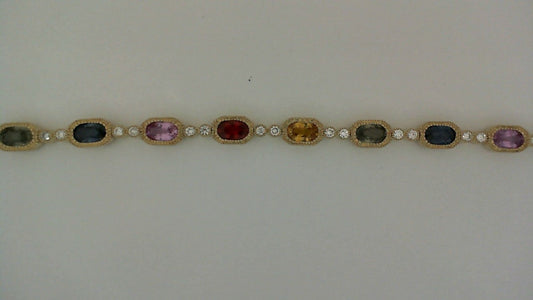 ReMARKable Designs Color Gemstone Bracelet in 14 Karat Yellow Gold with 17 Oval Sapphires 6.29ctw