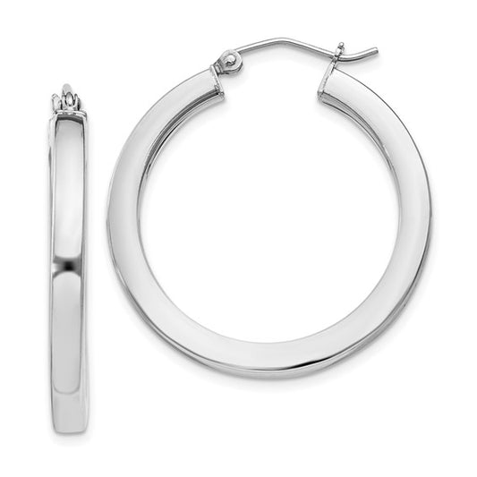 Sterling silver medium hoop earrings, latchback closure.