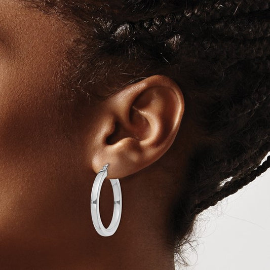Sterling silver medium hoop earrings.