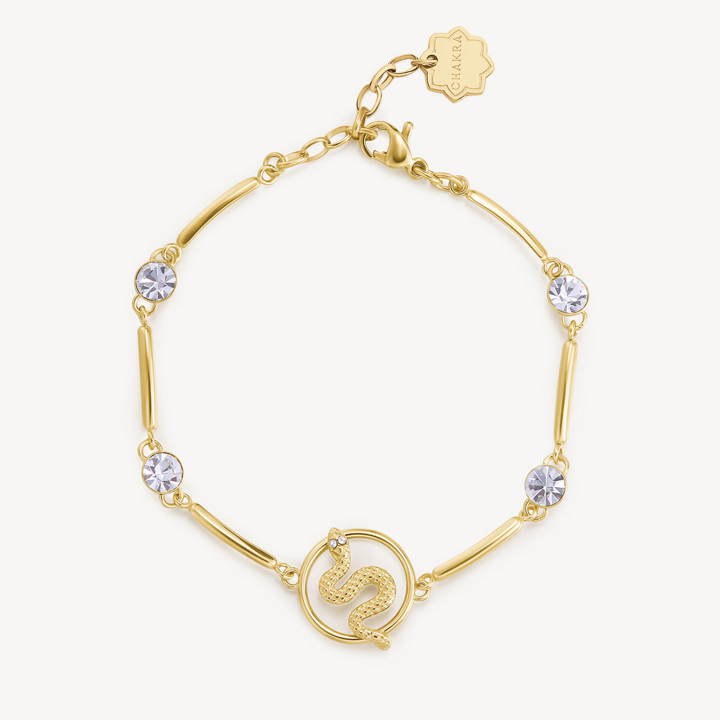 Gold-plated bracelet with simulated diamonds and snake design.