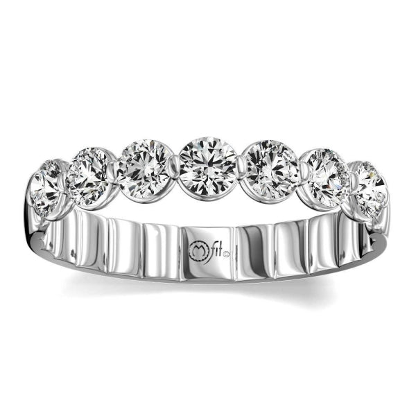 Seven round diamonds on tan band.