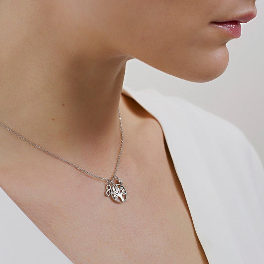 Stainless steel necklace with circular pendant.