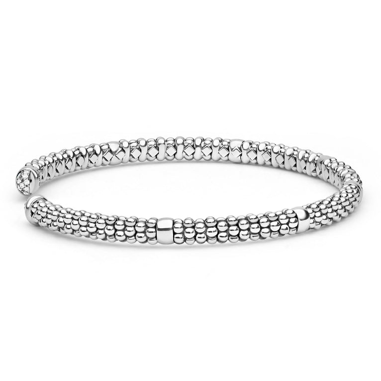 Sterling silver cuff bracelet with diamond accents.