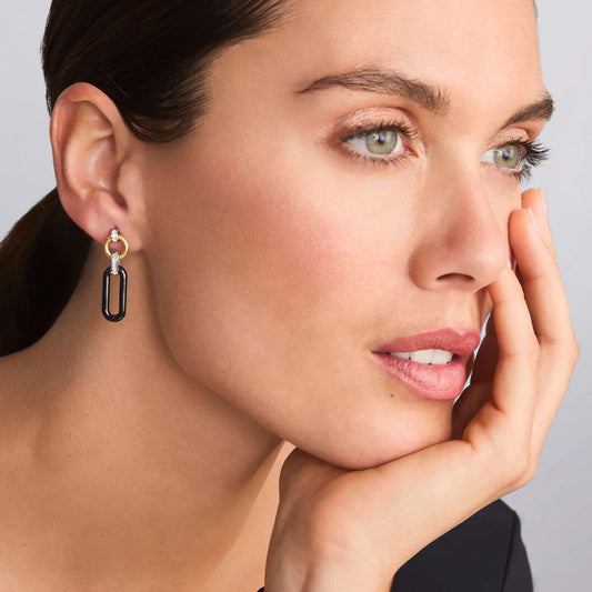 Sterling silver diamond drop earrings.