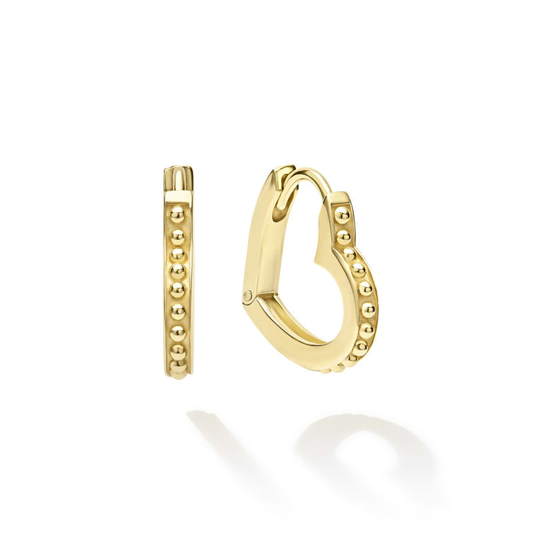 Heart-shaped yellow gold earrings, polished finish.