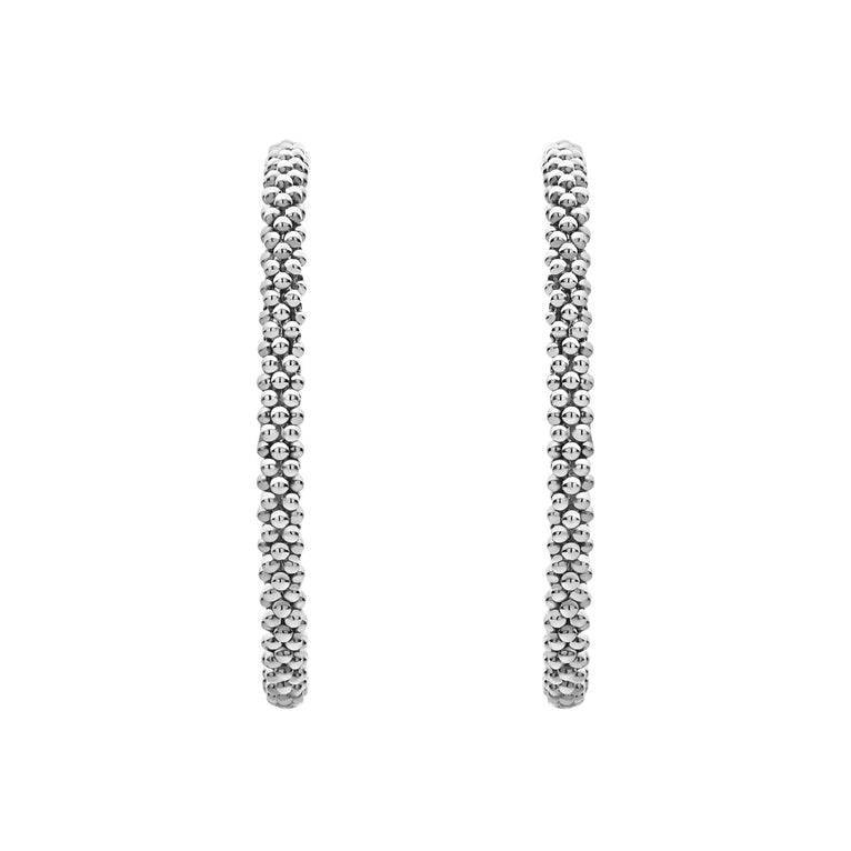 Sterling silver textured hoop earrings.