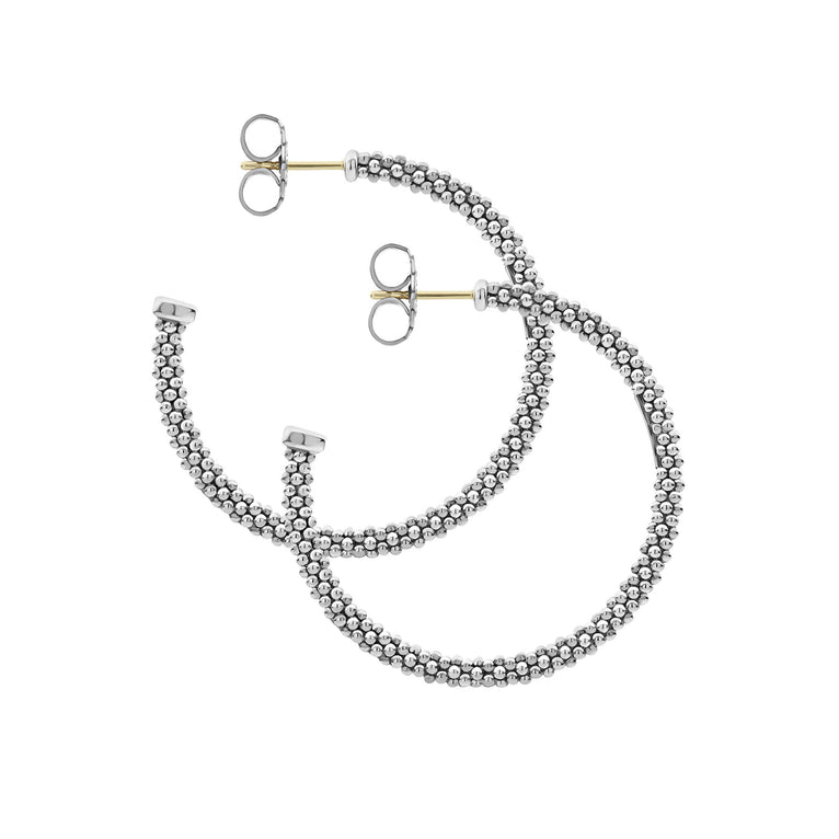 Sterling silver textured large hoop earrings.
