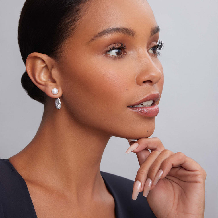 Sterling silver earrings with white pearls.