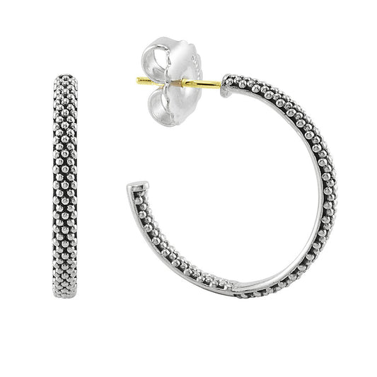 Sterling silver beaded hoop earrings.