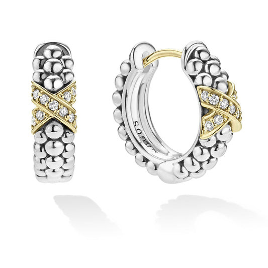Sterling silver gold diamond huggie earrings.