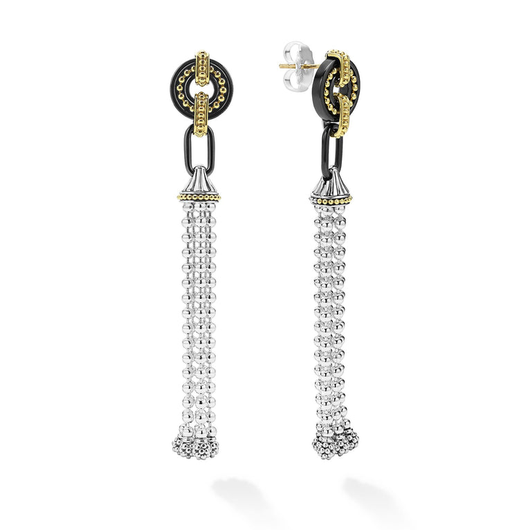 Sterling silver and gold dangle earrings.