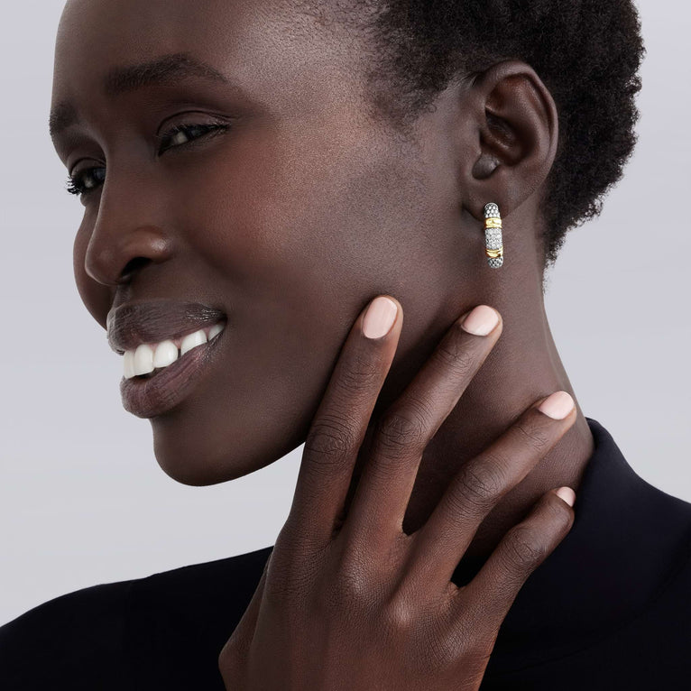 Sterling silver hoop earrings with diamonds.