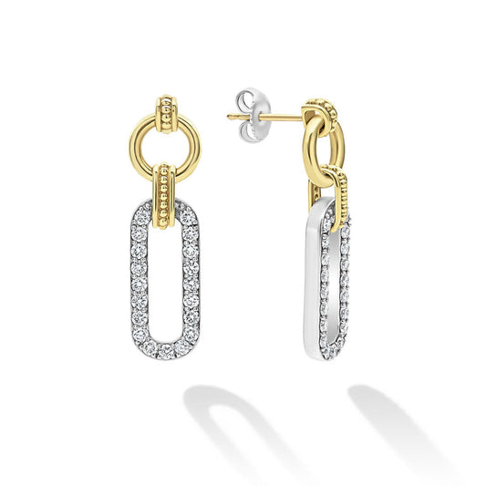 Gold and silver diamond drop earrings.