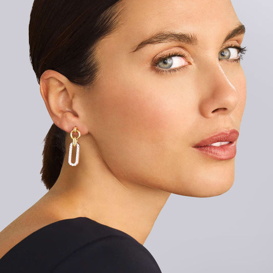 Sterling silver diamond drop earrings.