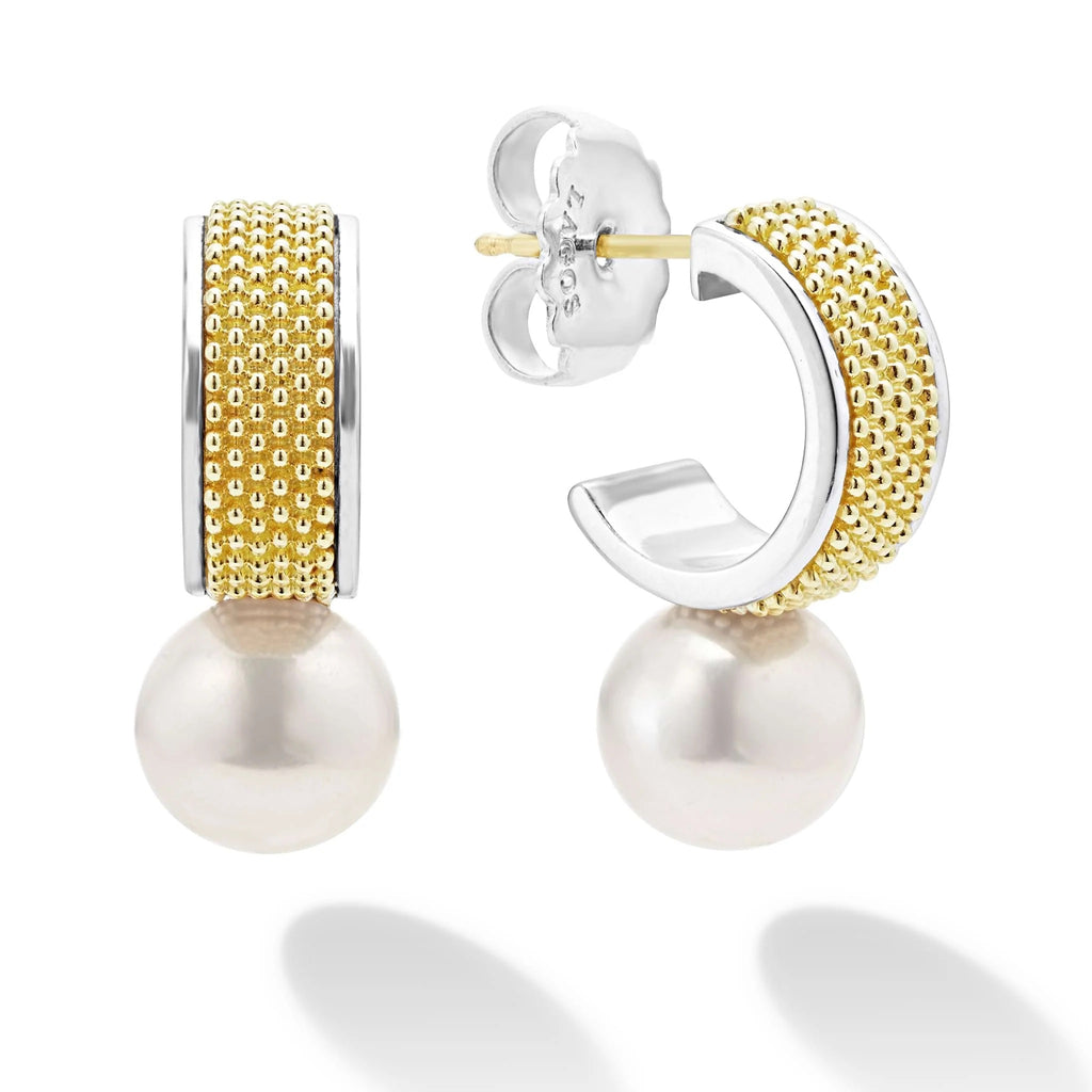 Sterling silver half hoops with yellow pearls.