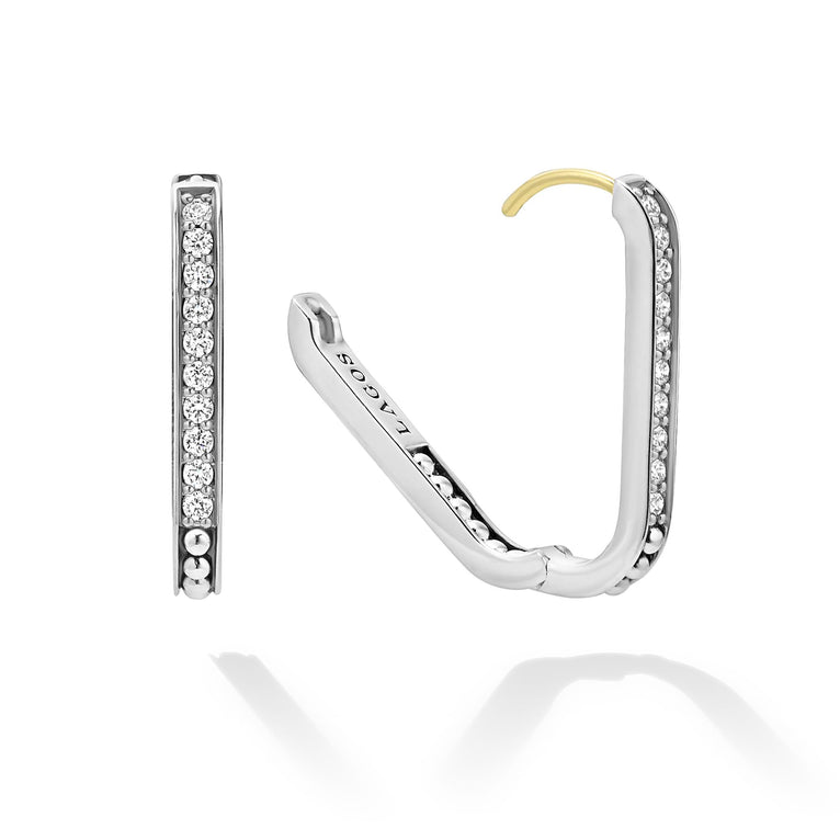 Sterling silver hoop earrings with diamonds.