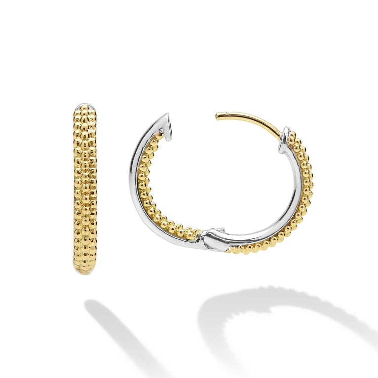 Sterling silver hoop earrings, yellow bead accents.