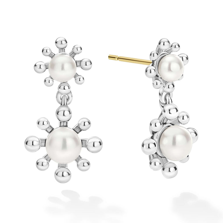 Sterling silver earrings with freshwater pearls.