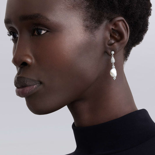 Baroque pearl drop earrings in silver.