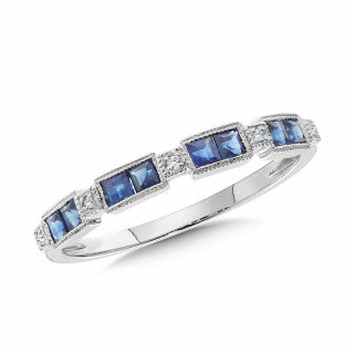 14K white gold band with princess sapphires.