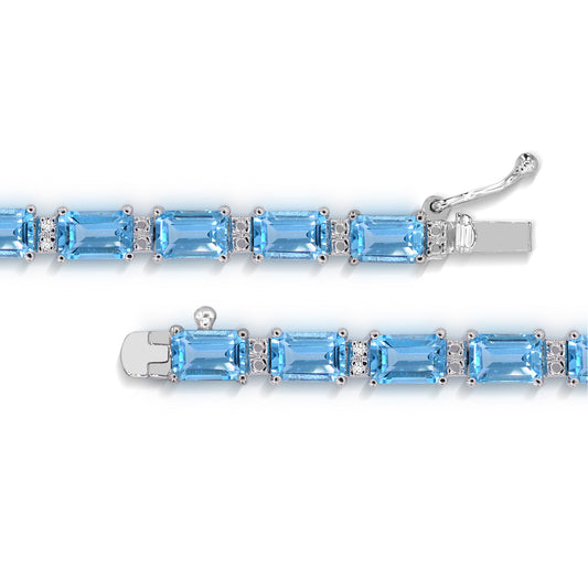 Emerald-cut blue topaz and diamond bracelet.
