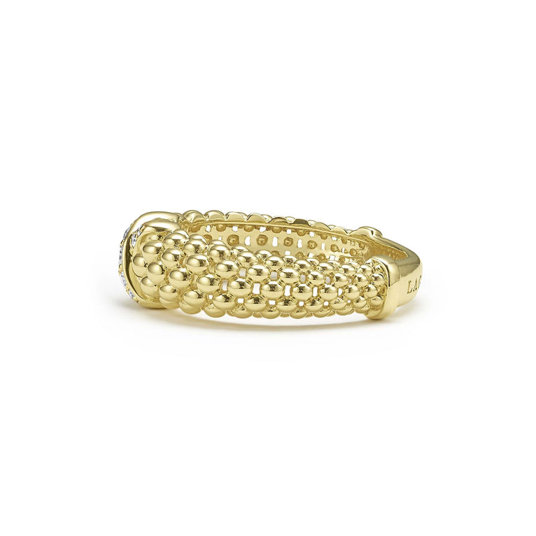 Gold ring with textured bead design.