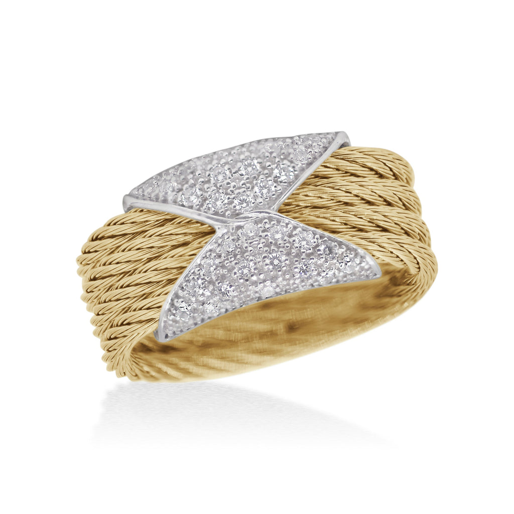Yellow gold ring with diamond accents.