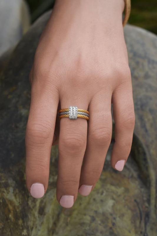 Stainless steel cable ring with diamonds.