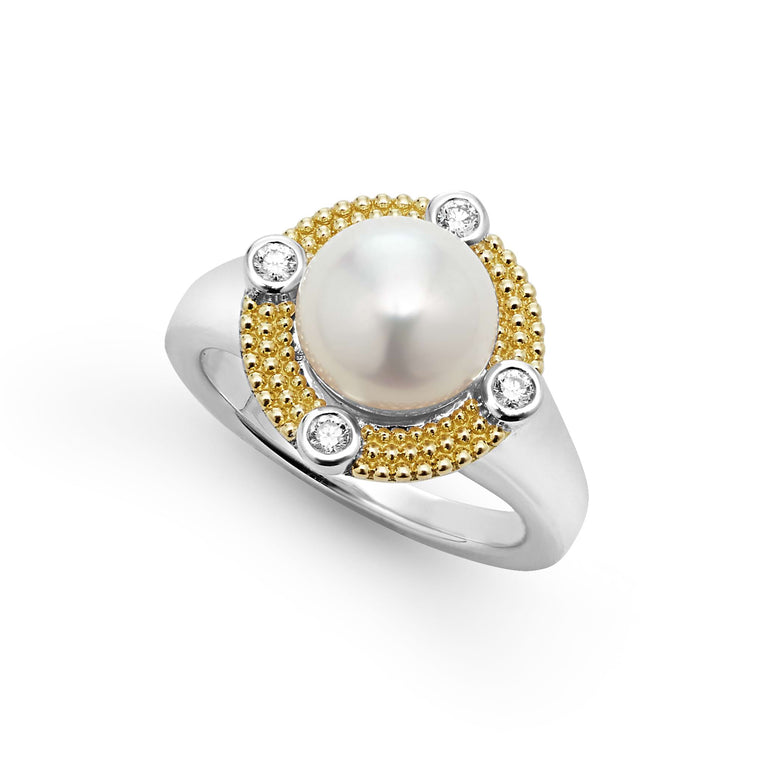 Pearl and diamond ring with gold accents.