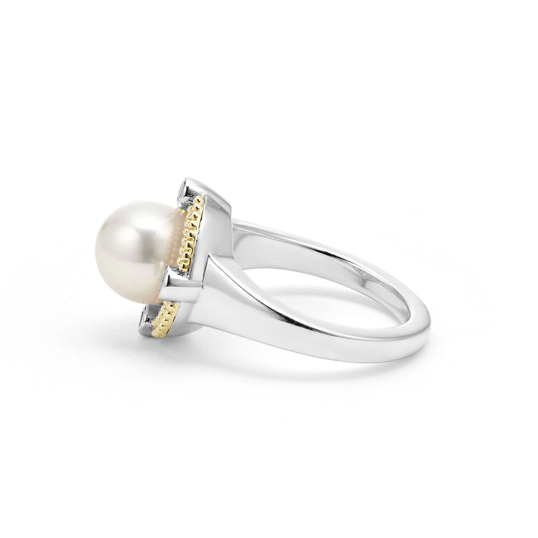 Sterling silver ring with pearl centerpiece.
