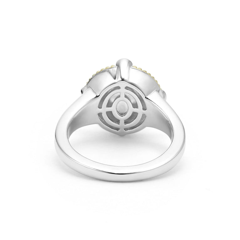 Sterling silver ring with intricate design.