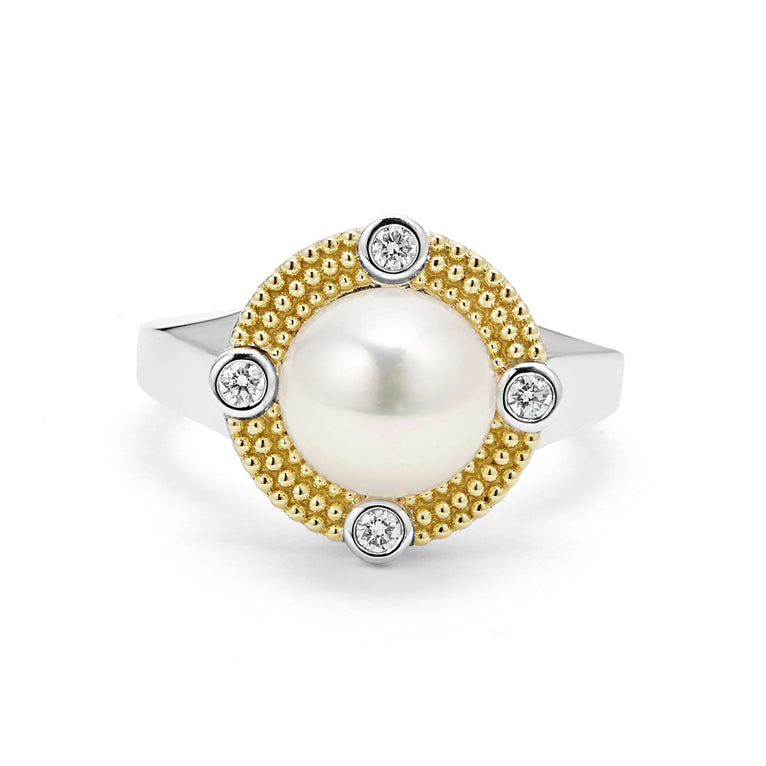 Pearl ring with diamond accents, gold detailing.