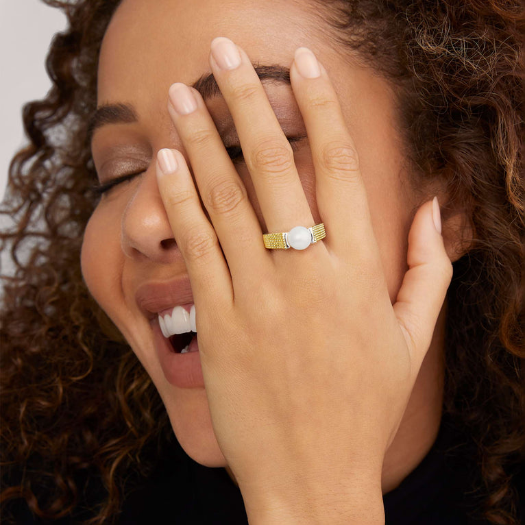 Sterling silver ring with white pearl.
