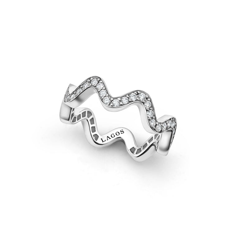 Sterling silver wave design diamond ring.