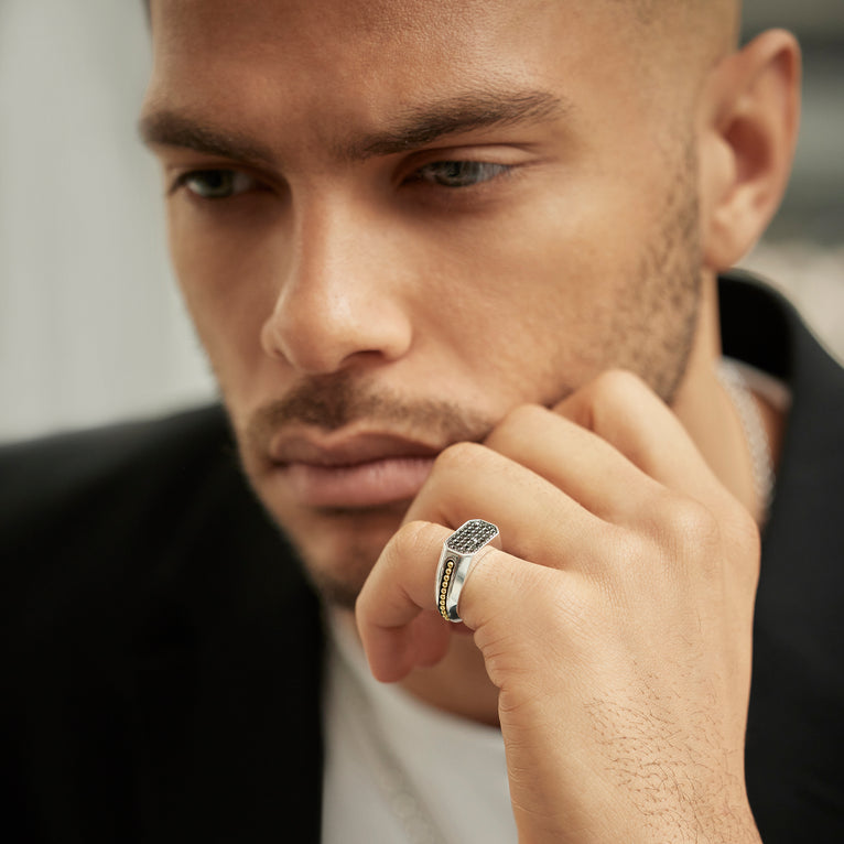 Sterling silver ring with yellow diamonds.