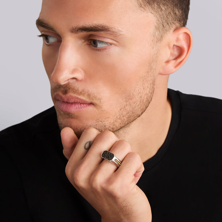 Sterling silver ring with yellow diamonds.