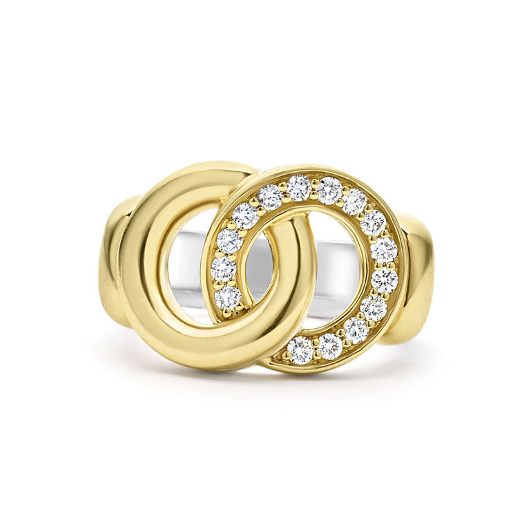 Gold and diamond interlocking ring design.
