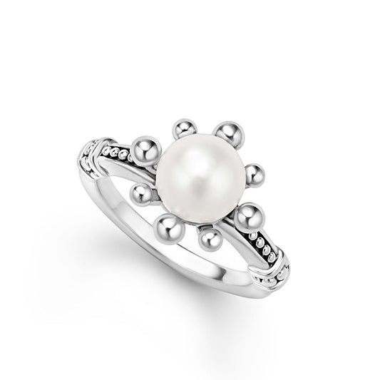 Sterling silver ring with central white pearl.