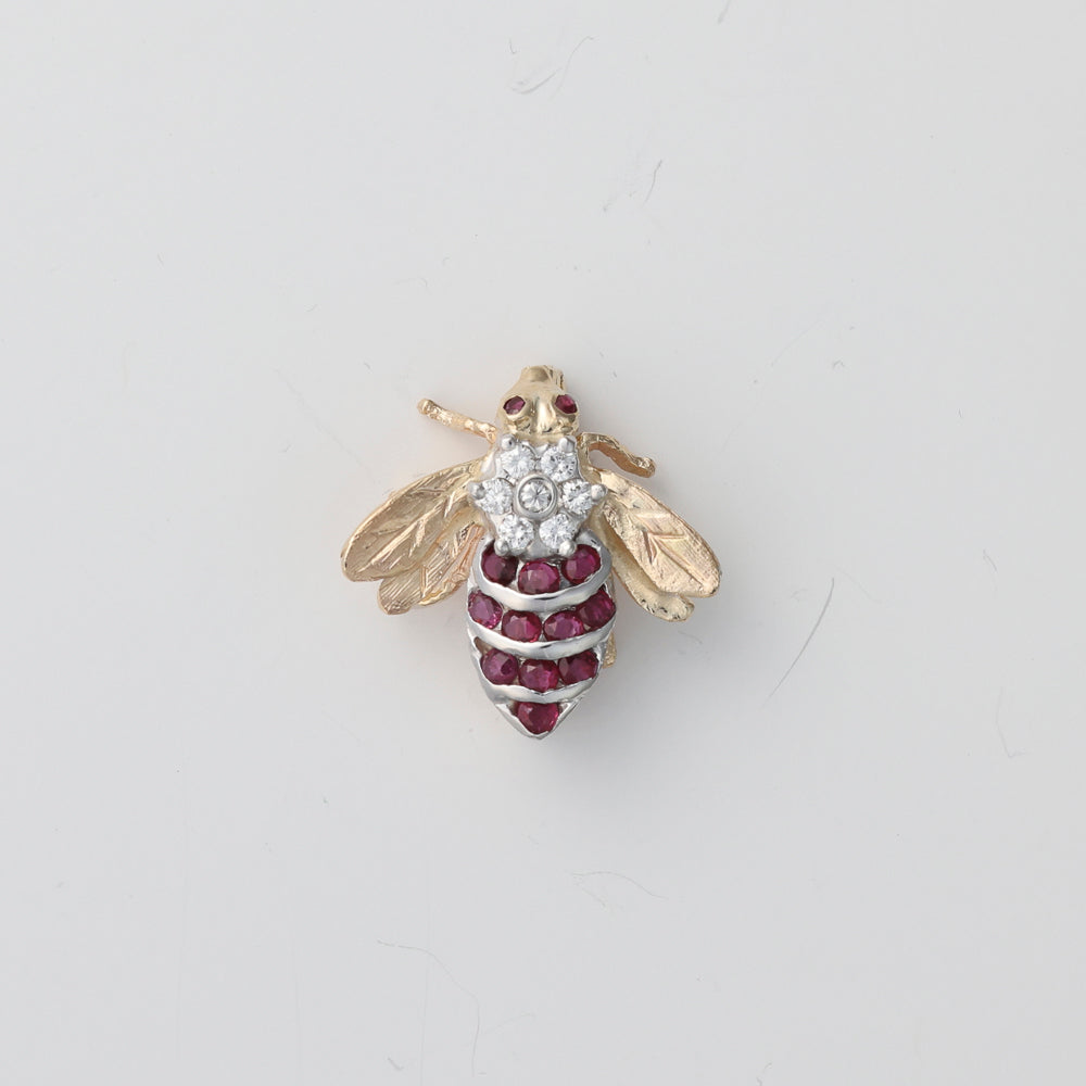 Ruby and diamond bumble bee pin.